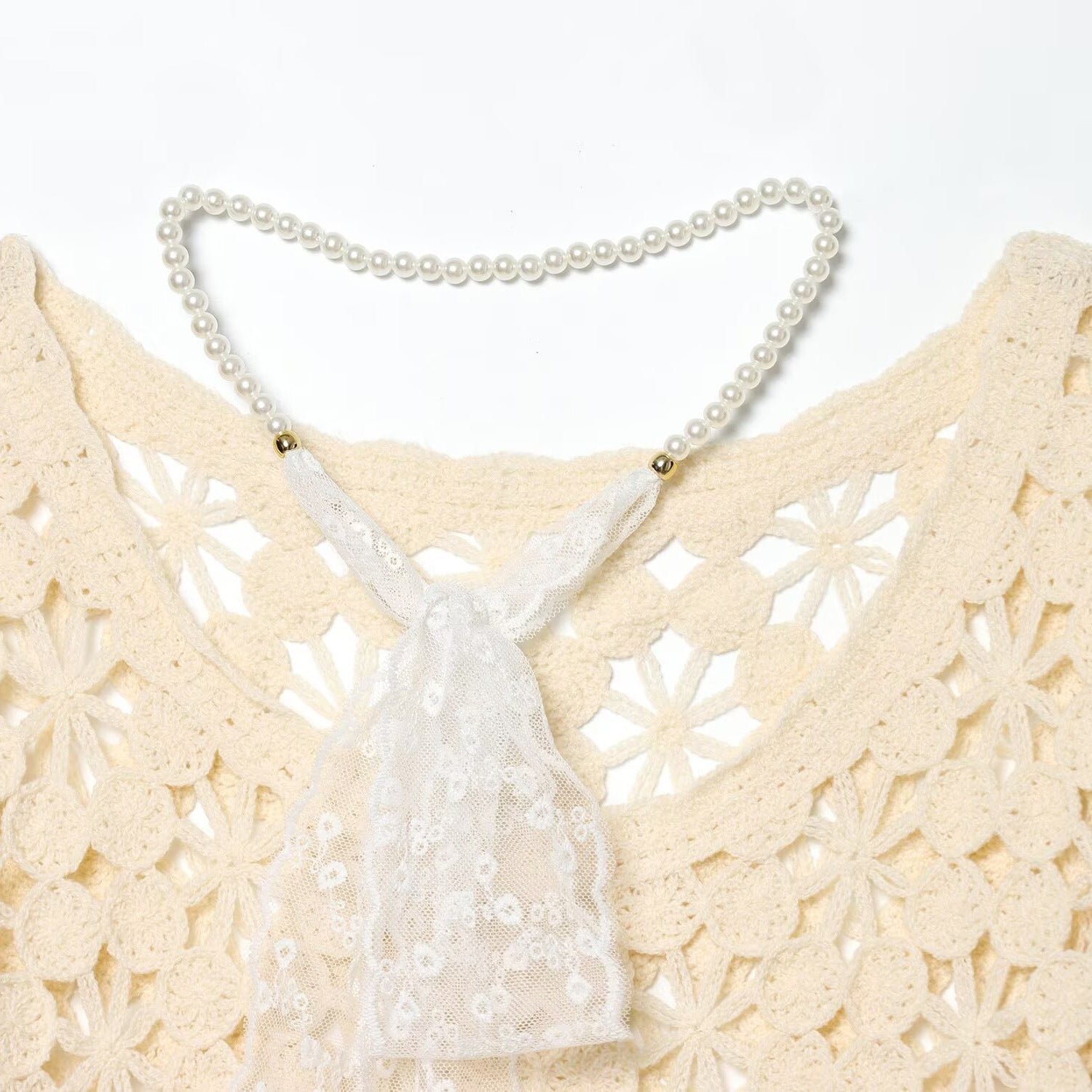 Lace embroidered sleeve crochet hollow long sleeved knitted sweater